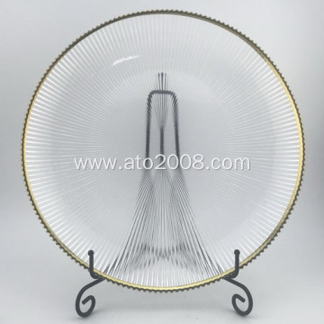 Clear glass plate dinner with gold rim